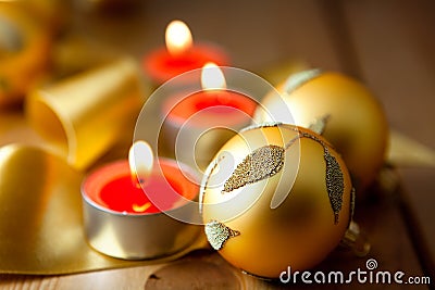 Golden christmas decoration and candles Stock Photo