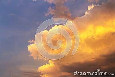 Golden clouds on blue sky Stock Photo