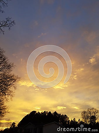 Golden Clouds on the Horizon Stock Photo