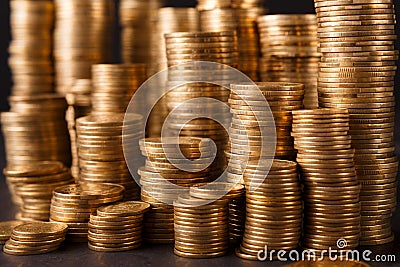Golden coin stacks, rich money background Stock Photo