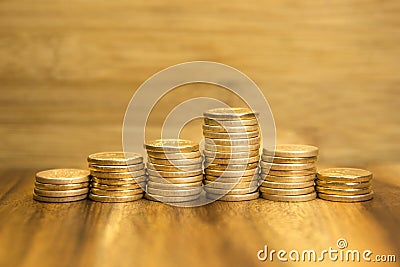 Golden coins piles Stock Photo