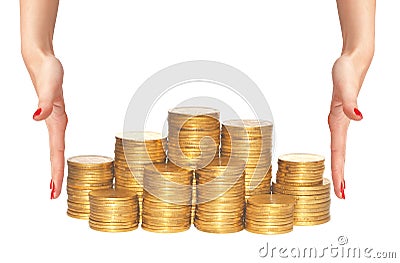 Golden coins and woman hands isolated on white Stock Photo