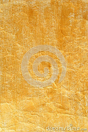 Golden color painted crinkled paper Stock Photo