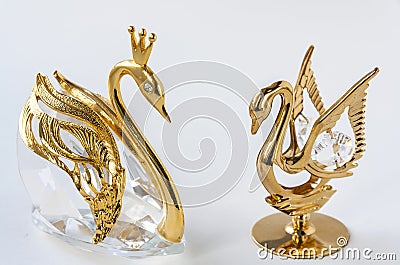 Golden couple swans figurine Stock Photo