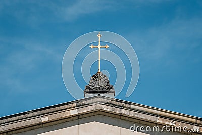 Golden cross on church roof - religion symbol - christianity Stock Photo