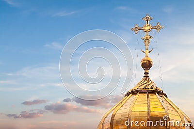 Golden cross dome blue sky background spring easter sunset Stock Photo