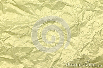 Golden crumpled paper background. Yellow crease paper texture. Copy space. Place for text Stock Photo