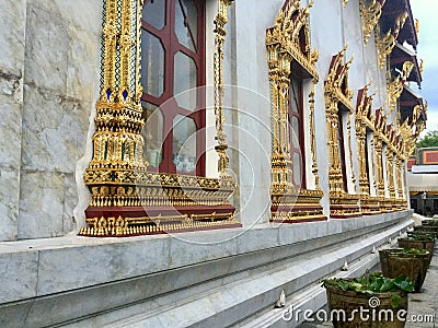 Golden decorated Window in Temple of Bells, Bangkok Stock Photo