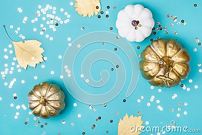 Golden decorative pumpkins and sparkles frame. Halloween or Thanksgiving background Stock Photo