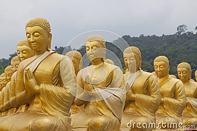 Golden disciple statues Stock Photo