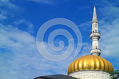 Golden Dome and Ornate Minaret of Batumi Mosque Against Vibrant Blue Sky, Batumi, Adjara, Georgia Stock Photo