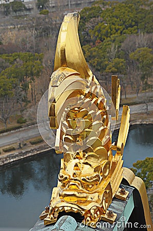 Golden dragon on roof of osaka castle Stock Photo