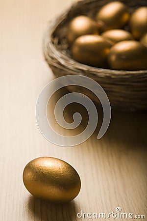 Golden Eggs In Nest Stock Photo