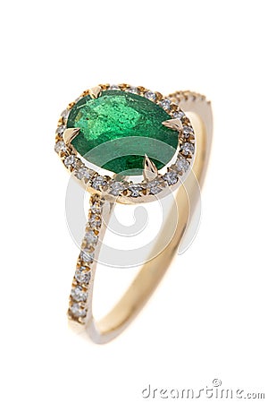Golden engagement ring with diamonds and emerald, isolated on white Stock Photo
