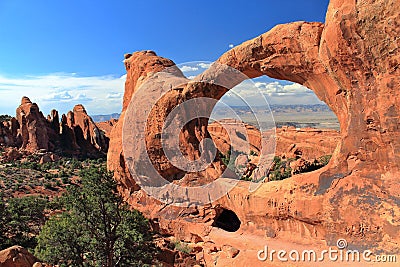 Double O Arch in Desert Landscape, Arches National Park, Utah Stock Photo