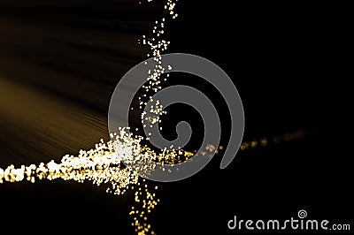 Golden fibre optic strands. Stock Photo