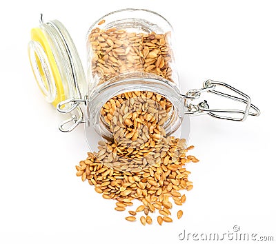 Golden flax seeds. Micronutrient beneficial for the organism that prevents and cures ailments. Rich in fiber and nutrients. Stock Photo
