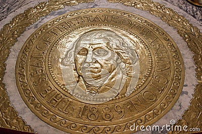 Golden floor seal with George Washington`s face Editorial Stock Photo