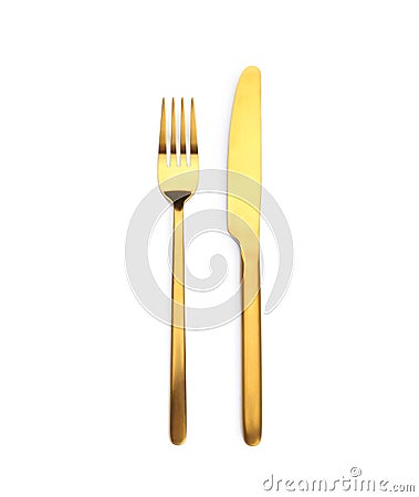 Golden fork and knife on white background Stock Photo