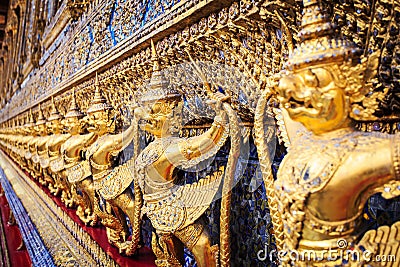 Golden garuda statues at Wat Phra Kaew in Grand Palace, Bangkok Stock Photo