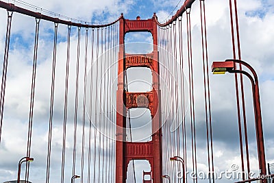 Golden Gate Bridge pylon and suspension cables; Golden Gate Bridge is a suspension bridge spanning the Golden Gate, the one-mile- Stock Photo