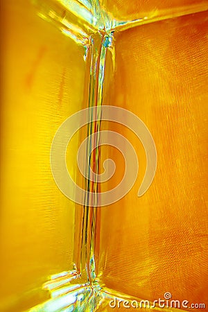 A rich shining golden glass background. Stock Photo