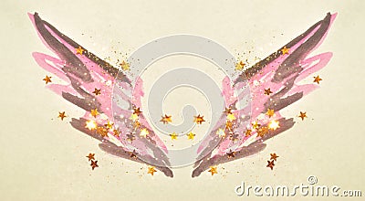 Golden glitter and glittering stars on abstract pink and black watercolor wings in vintage nostalgic colors Stock Photo