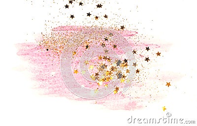 Golden glitter and glittering stars on abstract pink watercolor splash on white background Stock Photo