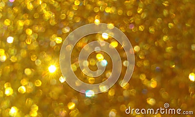 Golden glitter textured background,Bright beautiful shining golden glitter. Stock Photo