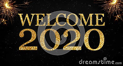 Golden glitter with the words welcome 2020 on black chalkboard background Stock Photo