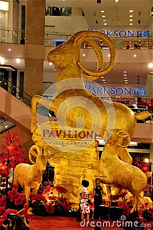 Golden Goat status in Pavilion Kuala Lumpur Malaysia The year of Goat 2015 Editorial Stock Photo