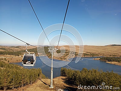 Golden Gondola on the mountain Zlatibor in Serbia Editorial Stock Photo