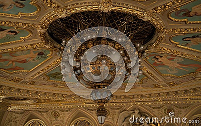 Golden gothic style ceiling chandelier in opera house in L'viv city Stock Photo
