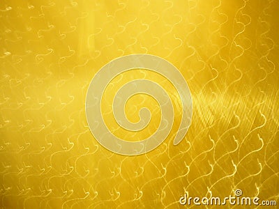 Golden hairline stainless. Shiny gold foil metal light line pattern surface texture. Close-up of interior material wall for design Stock Photo