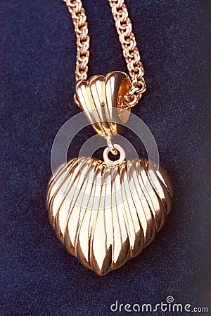 Golden heart necklace Stock Photo