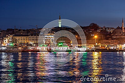 Golden Horn at night and Historic Fire Tower Editorial Stock Photo