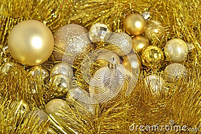Golden Ñhristmas balls and garland Stock Photo