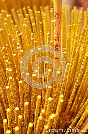 Golden incense stick Stock Photo