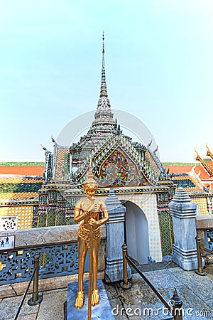 A Golden Kinnari statue att he Temple of the Emerald Buddha (Wat Phra Kaew) , Bangkok, Thailand Editorial Stock Photo