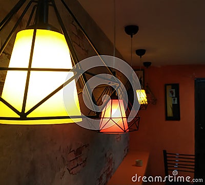 Golden Lamp shade in a cafe Stock Photo