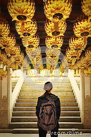 Golden lanterns adventurous girl Stock Photo