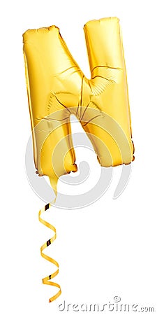 Golden letter N made of inflatable balloon with a string isolated on white background Stock Photo