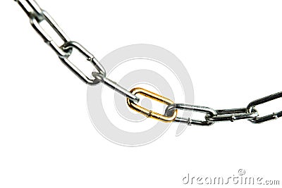 Golden link in a steel chain Stock Photo