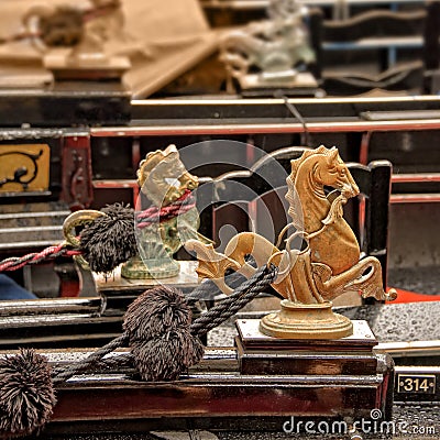 Golden lion, a detail of a gondola, Venice Stock Photo