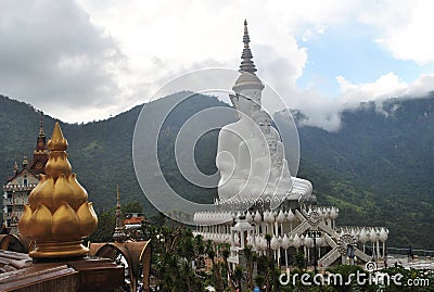 Golden Lotus and White buddhism Sit and Meditation architecture with Background mountain and cloud wild view thailand Stock Photo