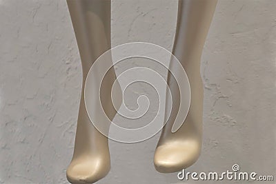 Golden mannequin legs Stock Photo