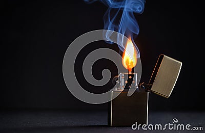 Golden metal lighter and smoke Stock Photo