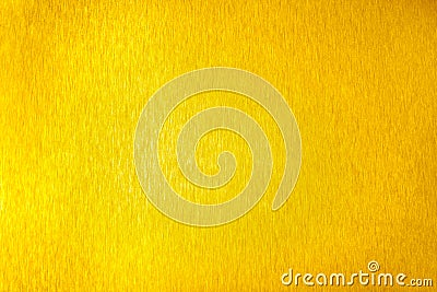 Golden metal shiny empty surface, yellow shining metallic background, gold sheet backdrop close up, decorative sparkling texture Stock Photo