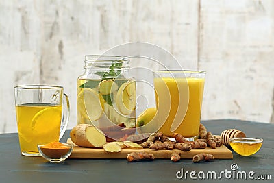 Golden milk detox water turmeric lemon and ginger Stock Photo