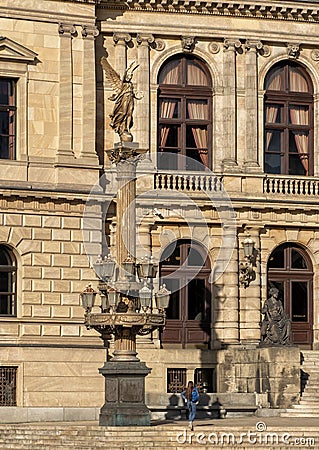 Golden Muse Column in front of the Rudolfinum situated on Jan Palach Square, Prague, Czechoslovakia Editorial Stock Photo